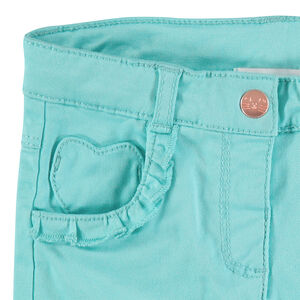 Pantalón de algodón azul con bolsillos con volantes 