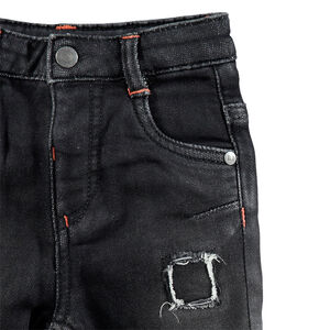 Vaqueros con efecto desgastado y pespuntes que contrastan 