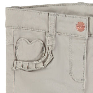 Pantalón de algodón liso con bolsillo con forma de corazón y volantes 