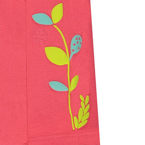 Camiseta interior de punto con estampado vegetal y cierre mediante automáticos en la espalda. 