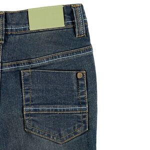 Jean slim effet used à surpiqûres contrastées 