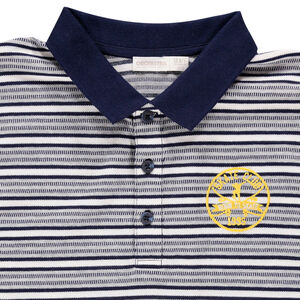 Júnior - Polo de manga corta de rayas y con escudo bordado 