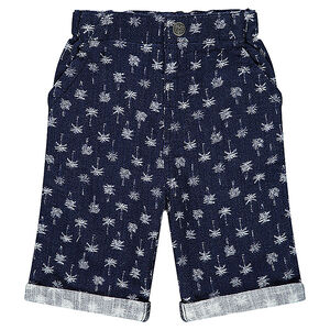 Bermudas de tela con palmeras estampadas all over. 