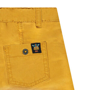 Pantalón de sarga ceñido con forro de punto y bolsillos con cremallera 