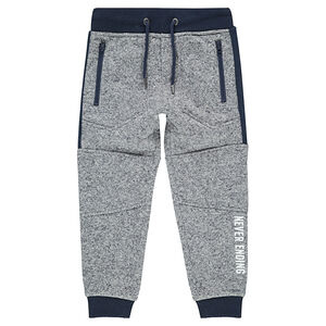 Pantalón de chándal de felpa con bolsillos con cremallera y cortes 