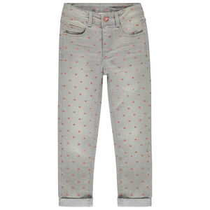 Vaqueros con efecto desgastado y estrellas estampadas all over 