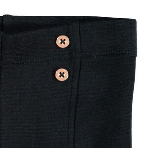 Legging de punto milano con botones dorados y volantes 
