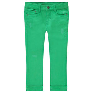 Pantalón de algodón liso verde con efecto desgastado.  