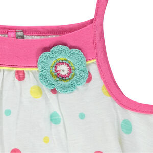 Túnica con finos tirantes y lunares all over y flor bordada 