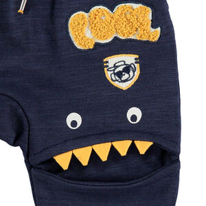 Pantalón de chándal de felpa slub con cortes con forma de monstruos 