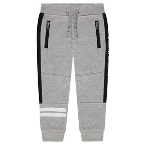 Pantalón de chándal con bandas estampadas y bolsillos con cremallera 