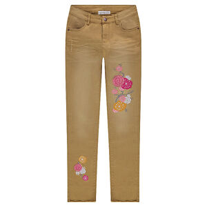 Vaqueros con efecto desgastado y arrugado con flores bordadas 