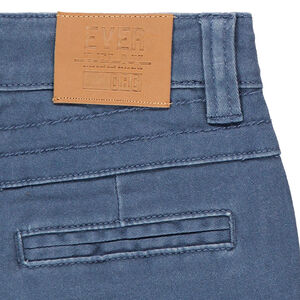 Pantalón teñido azul claro con bolsillo con cremallera 