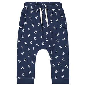 Pantalón de chándal de felpa con forma de sarouel y letras all-over 