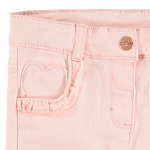 Pantalón de algodón liso con bolsillo con forma de corazón y volantes 