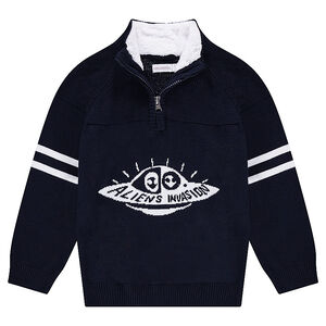 Jersey de punto con cuello de cremallera y forro de borreguito. 