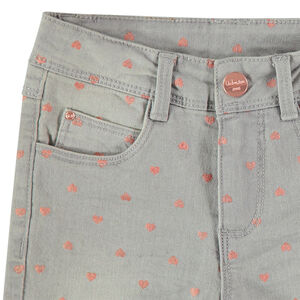 Vaqueros con efecto desgastado y estrellas estampadas all over 