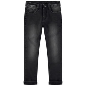 Vaqueros usados con efecto desgastado y arrugado con inscripción de relieve en la espalda 