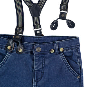 Vaqueros con efecto desgastado y tirandes desmontables 