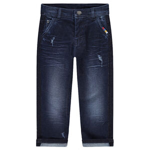 Vaqueros con efecto desgastado y arrugado con corte slim e inscripción con relieve 