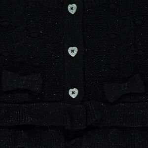 Chaqueta de punto con volantes y botones en forma de corazón 