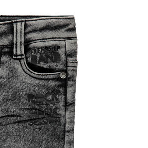 Vaqueros estilo denim de efecto desgastado con parche de guitarra 