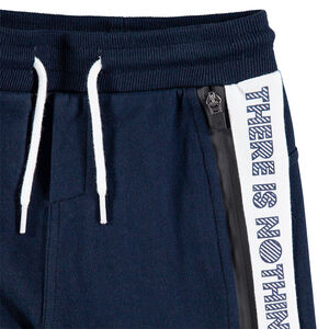 Pantalón de chándal con tiro bajo y bandas que contrastan 