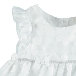 Vestido de gala de tul con flores del mismo color 