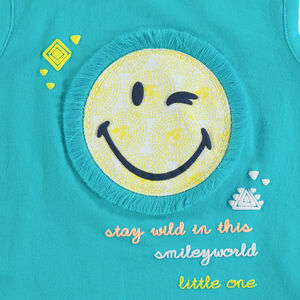 Camiseta de punto azul con parche de ©Smiley con flecos 