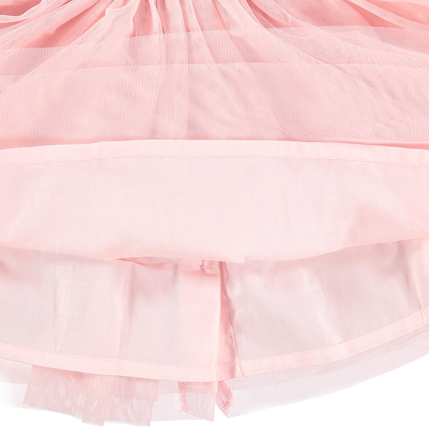 Vestido rosa de fiesta de dos materiales con tul y volantes 