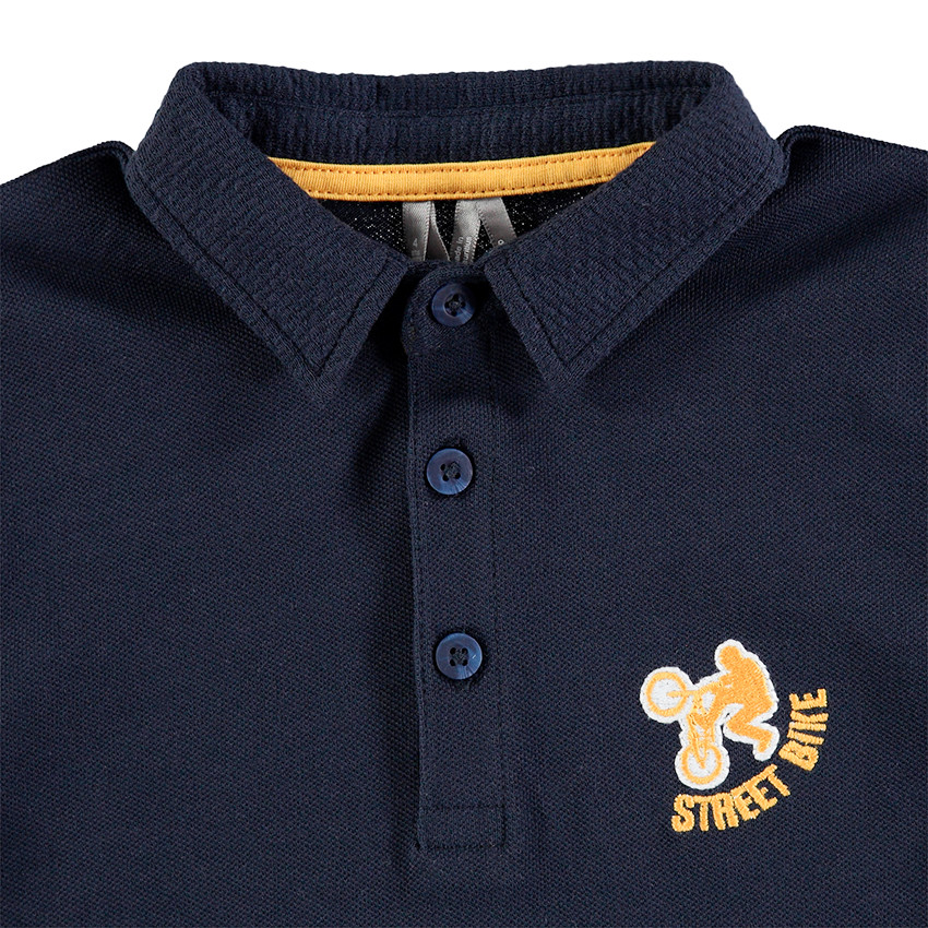 Polo de manga larga con dibujo bordado en el pecho 