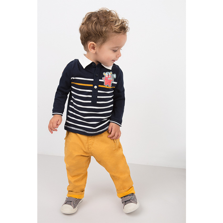 Pantalón de sarga ceñido con forro de punto y bolsillos con cremallera 