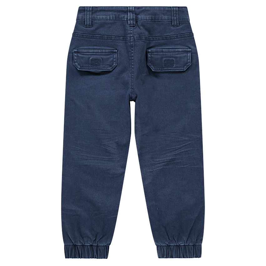 Pantalón teñido con bolsillos y tobillos elásticos 