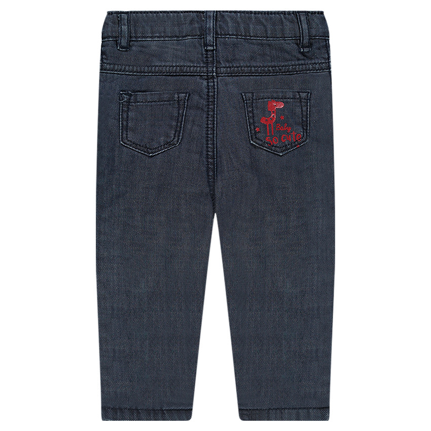 Vaqueros efecto arrugado con forro de punto y bolsillo estampado 