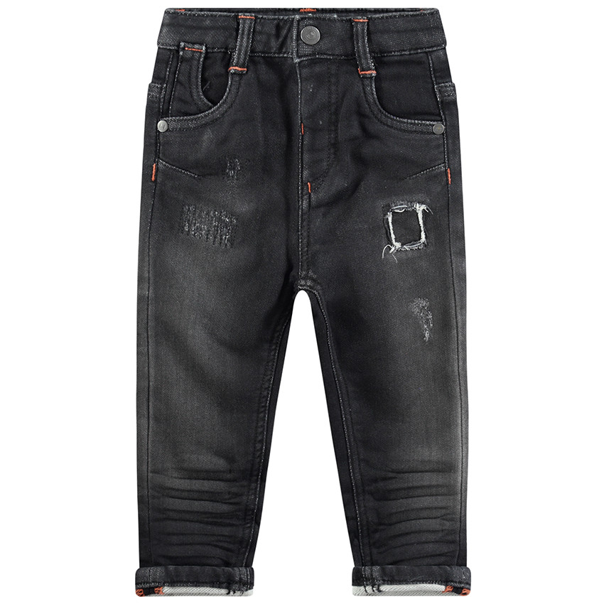 Vaqueros con efecto desgastado y pespuntes que contrastan 