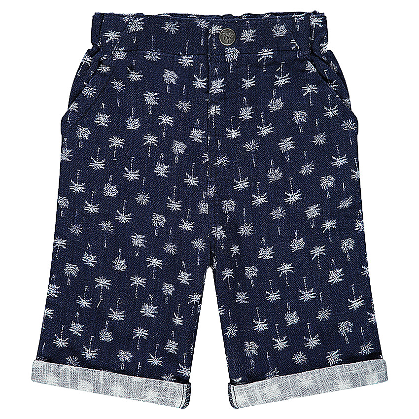 Bermudas de tela con palmeras estampadas all over. 
