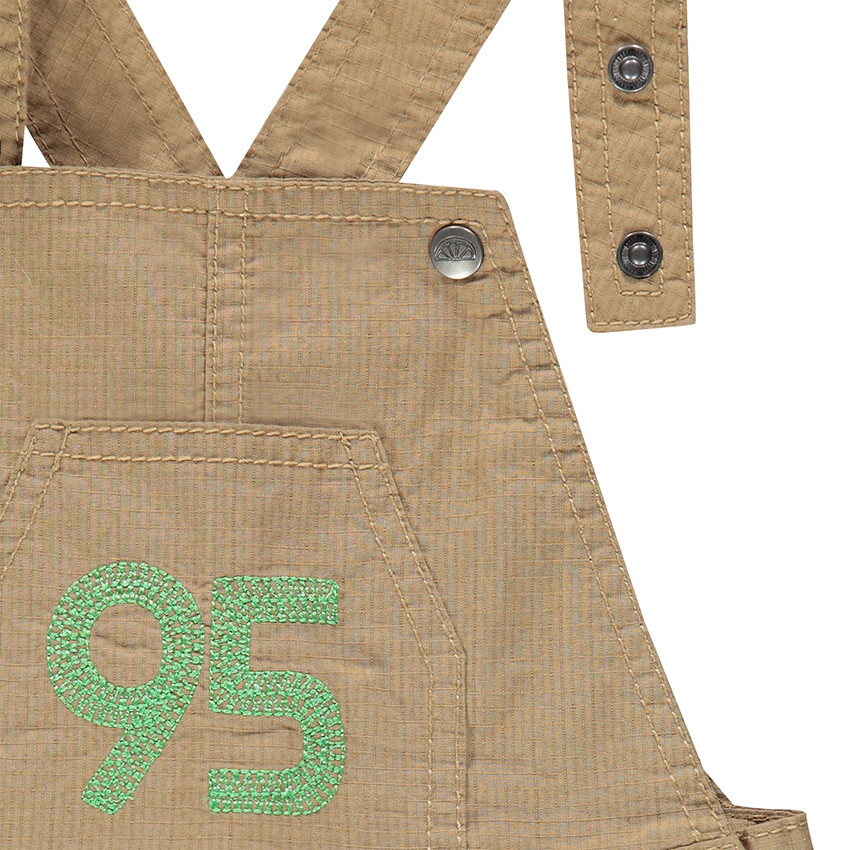 Peto de tejido antidesgarro con números bordados 