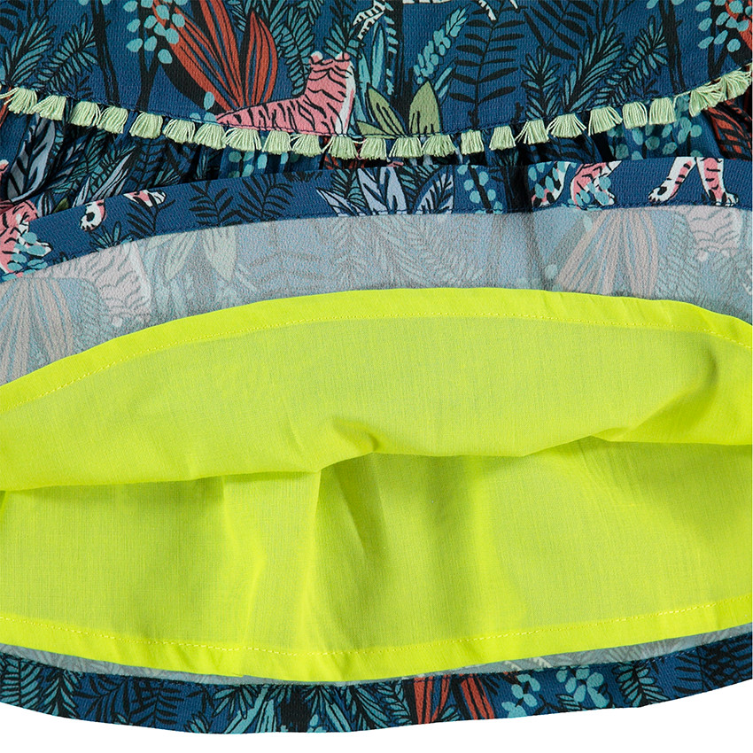 Túnica estampada con mangas acampanadas y pompones 