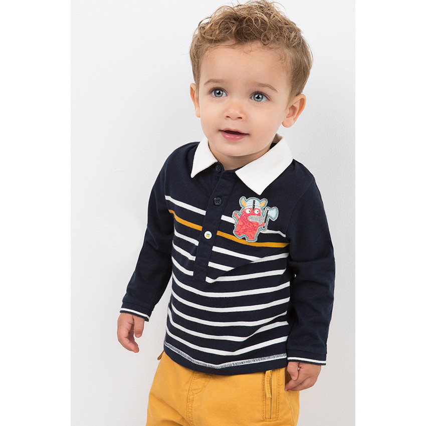 Pantalón de sarga ceñido con forro de punto y bolsillos con cremallera 