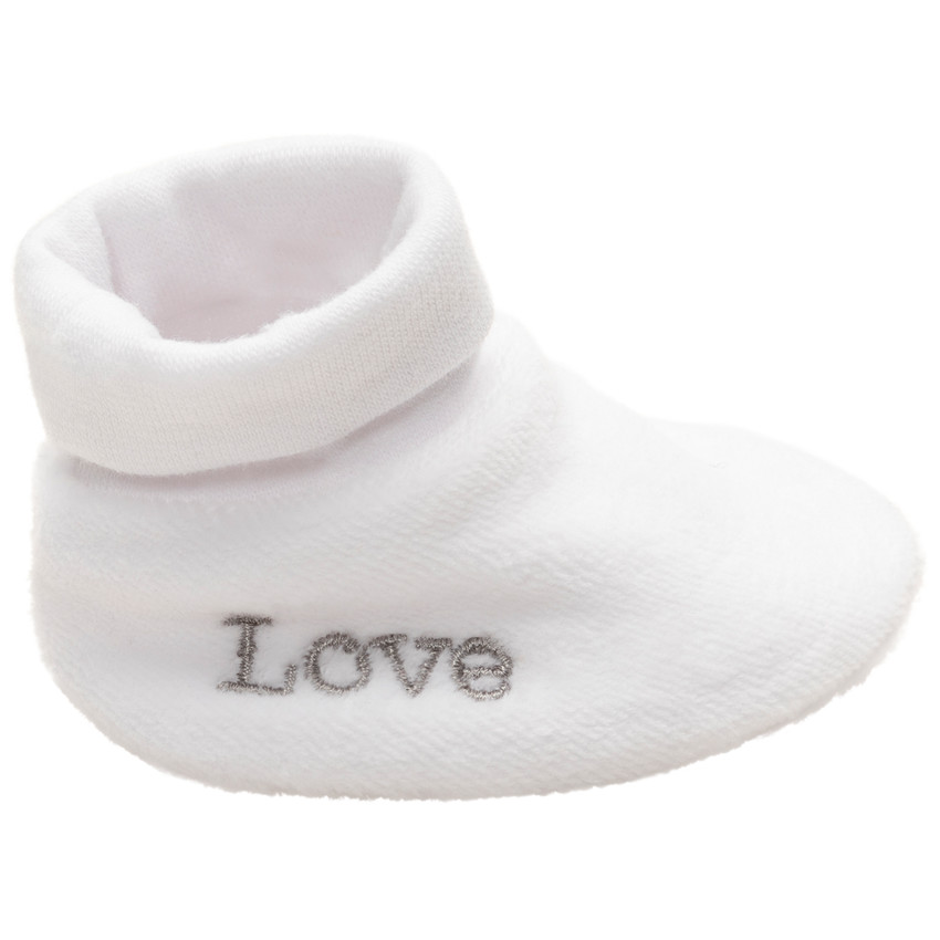 Zapatillas de terciopelo con inscripciones bordadas  