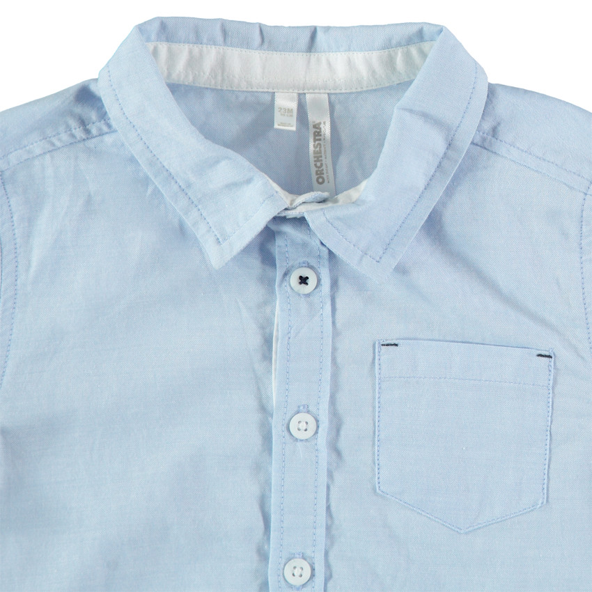 Camisa lisa de manga larga con bolsillo 