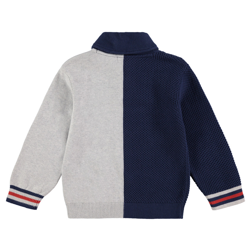 Jersey de punto bicolor con cuello con cremallera e inscripción de rizo 