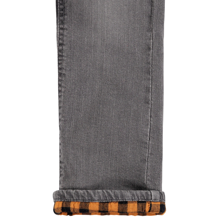 Vaqueros con tirantes y efecto arrugado 