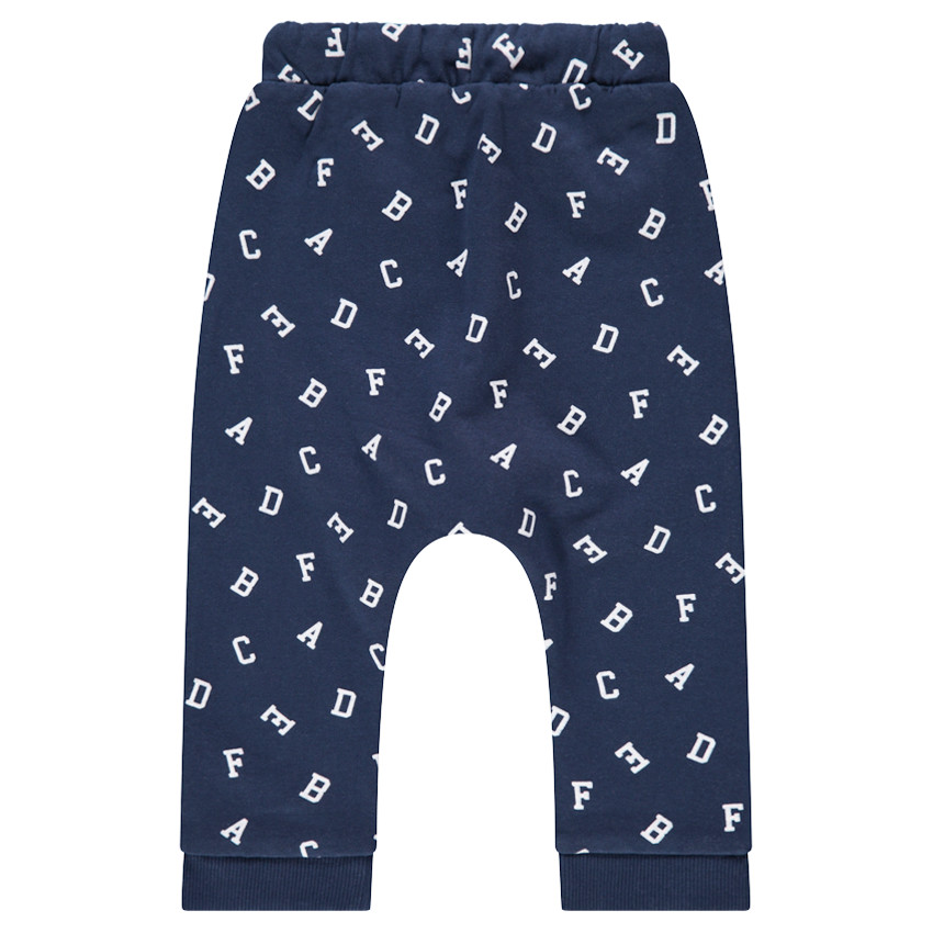 Pantalón de chándal de felpa con forma de sarouel y letras all-over 