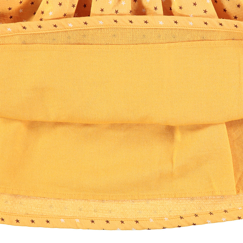 Túnica de manga larga color mostaza con lunares estampados all-over 