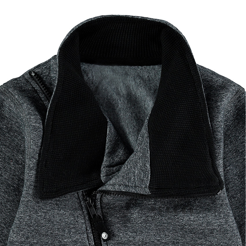 Chaqueta de felpa con cierre al bies y bolsillos con cremallera 