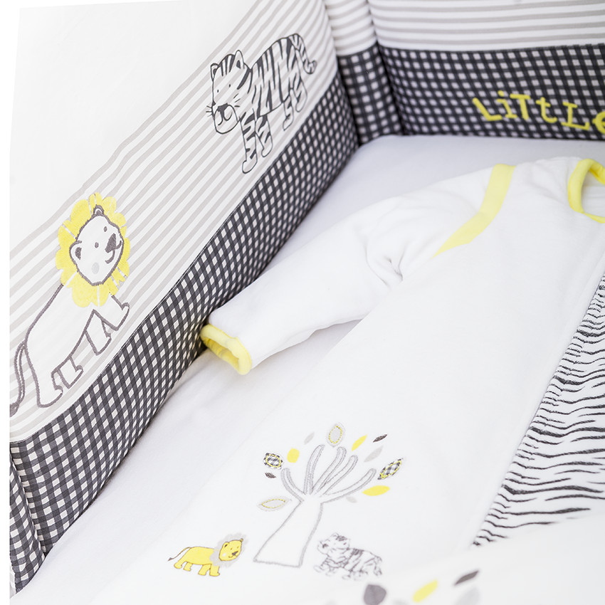 Protector de cuna de materia acolchada con impresos 