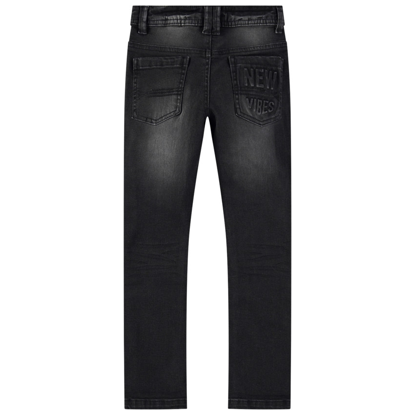 Vaqueros usados con efecto desgastado y arrugado con inscripción de relieve en la espalda 